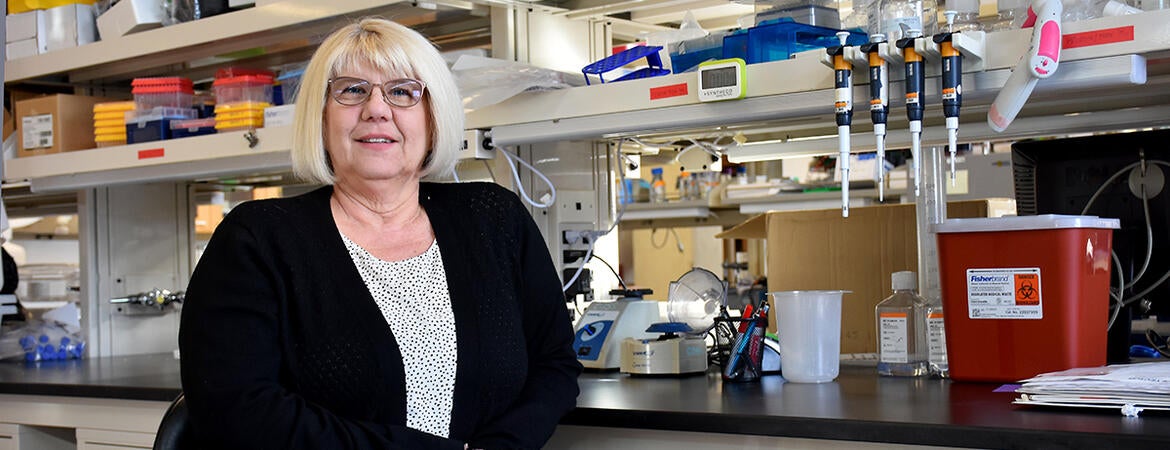 Coss in her lab