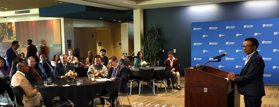 VC and Dean Deborah Deas speaking to attendees at the event