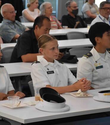 West Point cadets sitting at a table at UCR