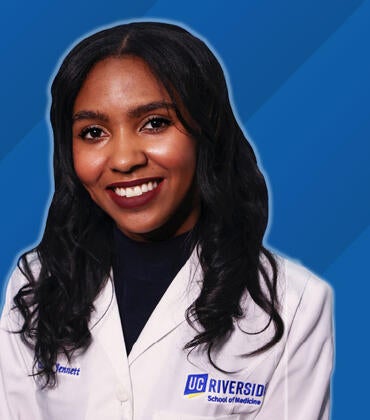 Headshot of Jennell Jennett on a blue background next to text reading "Class of 2026"