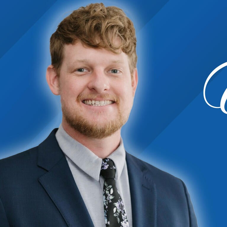 Headshot of Andrew McLain on a blue background next to text reading "Class of 2026"