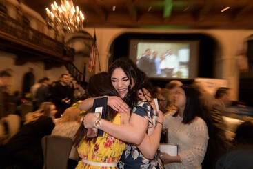 Alejandra Torres hugs Rita Lis at the 2019 match day