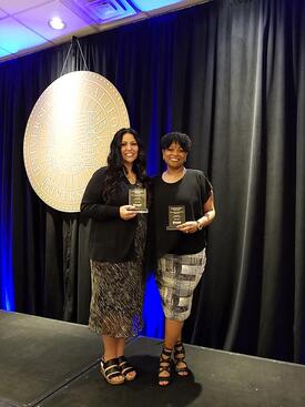 Theresa Luther and Kathleen Buckner receive their 2023 award.