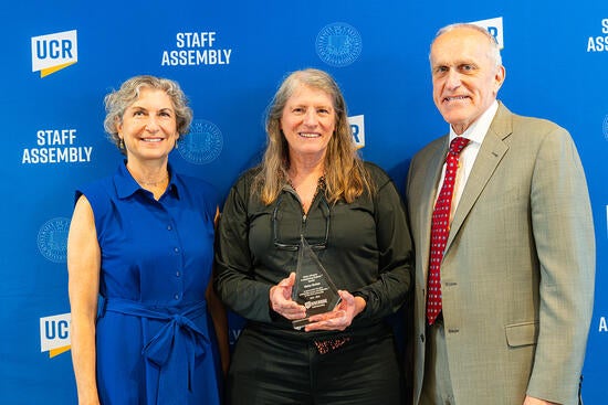 Kathy Barton with Provost Liz Watkins and Chancellor Kim Wilcox